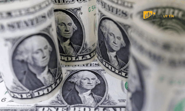 Chứng khoán tăng, đồng đô la Mỹ giảm trong khi Fed giảm tốc độ lãi suất