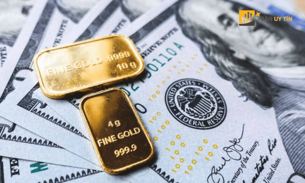 Vàng tăng nhờ nhu cầu trú ẩn, USD suy yếu